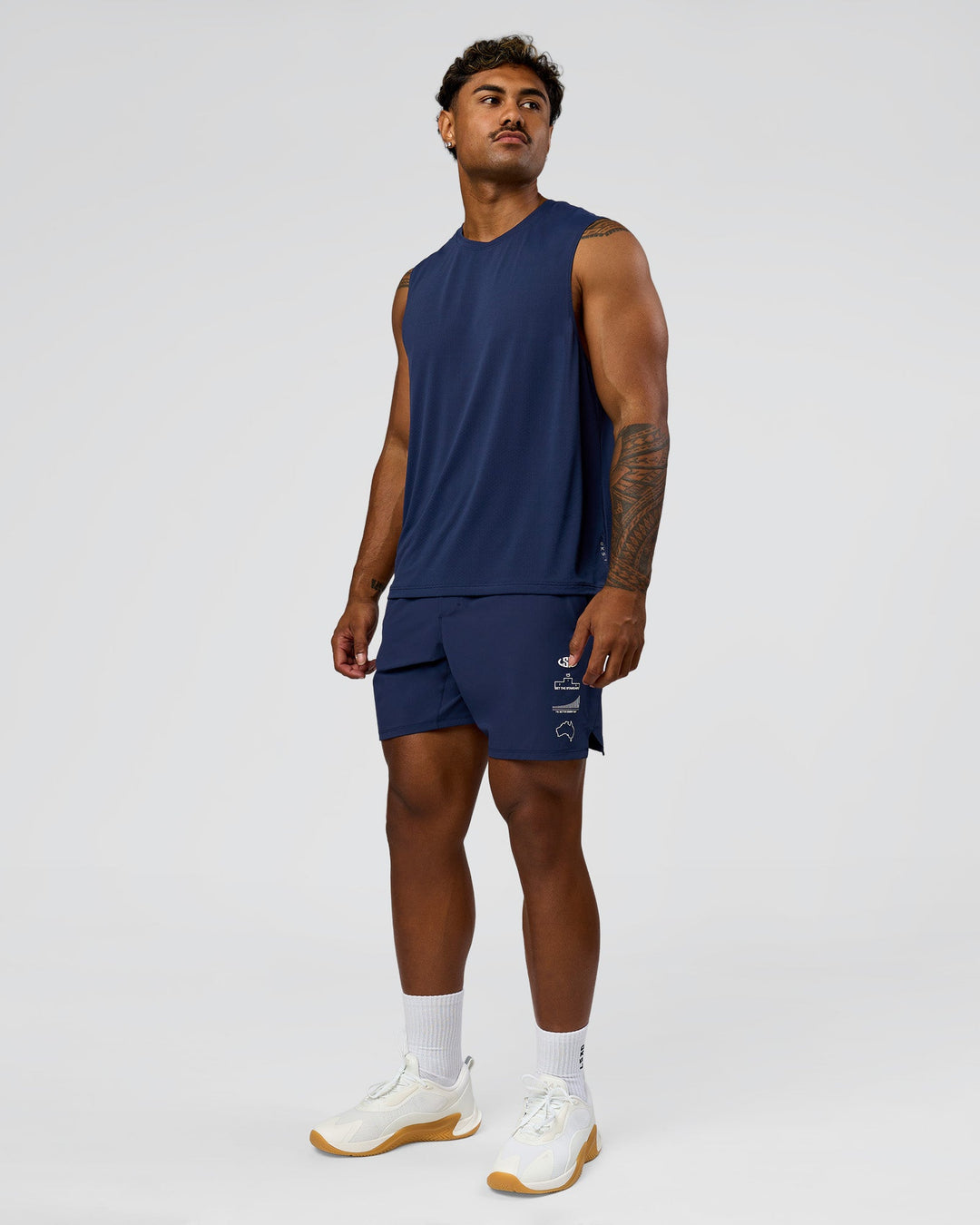 Man wearing Greatest of All Time Functional Training 7" Short - Future Navy-White | Model:Xav | Size:L - view 10