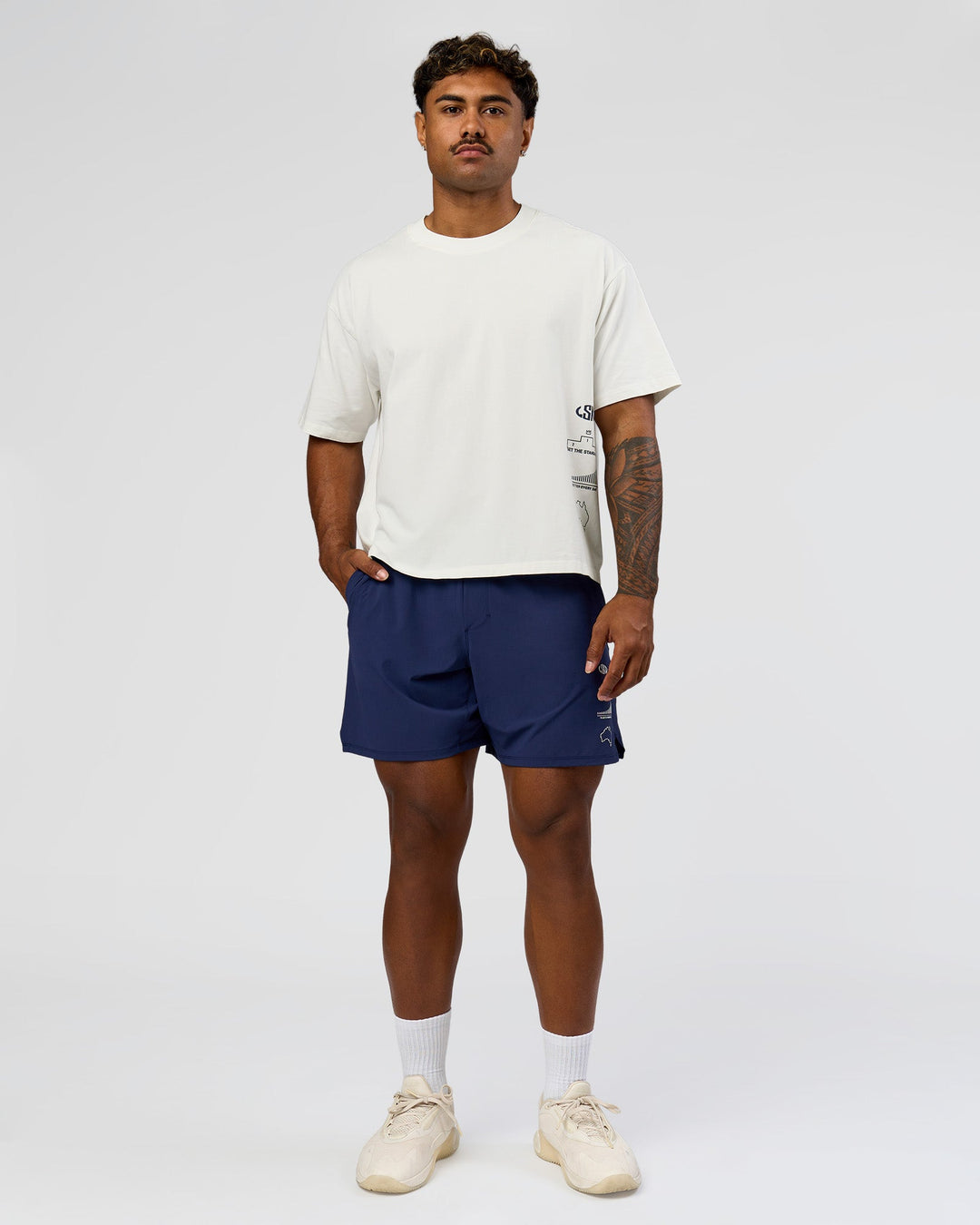 Man wearing Greatest of All Time Heavyweight FLXCotton Boxed Tee - Off White Washed | Model:Xav | Size:L - view 11