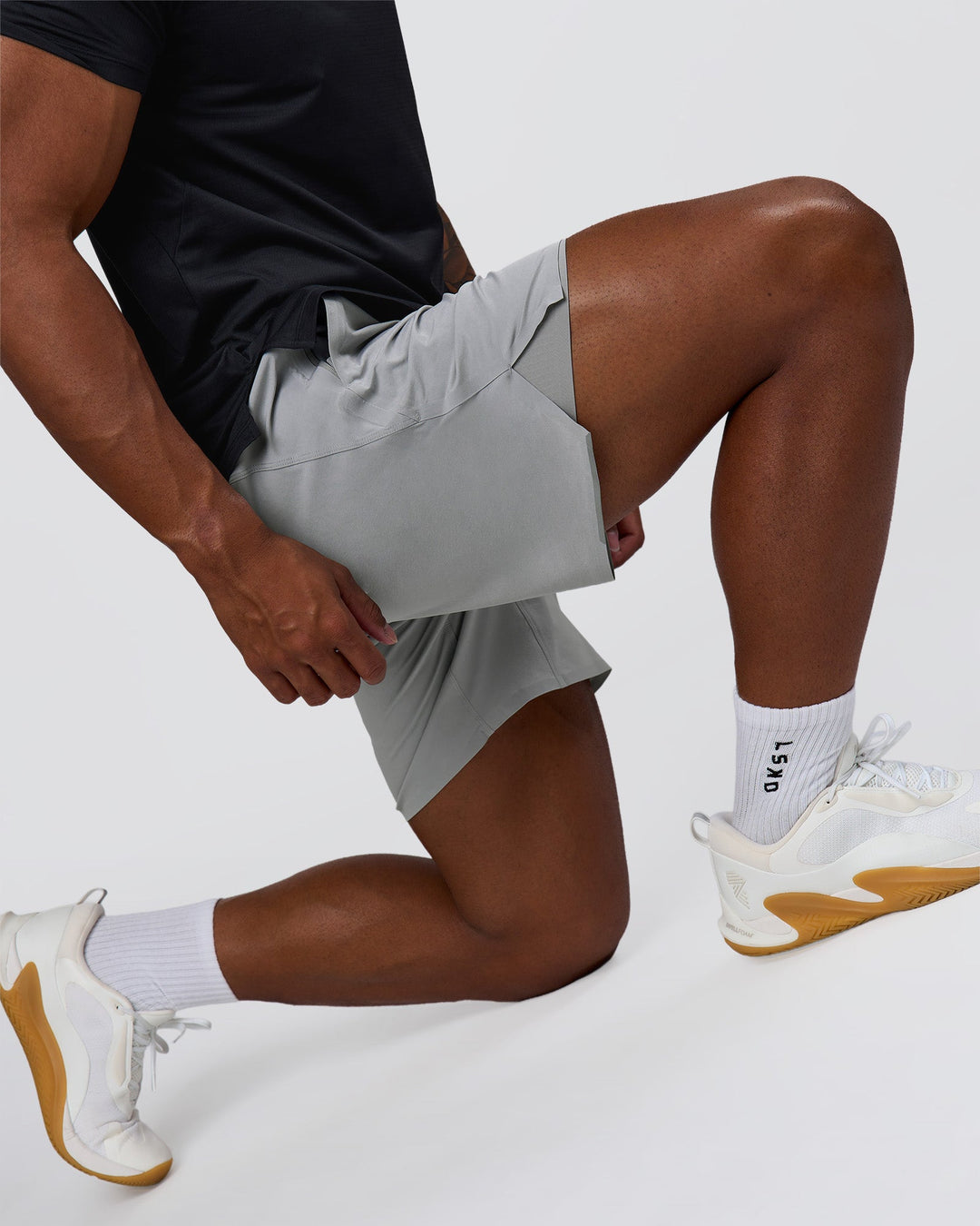 Man wearing Hybrid Lined 7" Short - Alloy | Model:Xav | Size:L - view 5