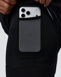 Man wearing Hybrid Lined 7" Short - Black | Model:Xav | Size:L | Thumbnail Index: 1