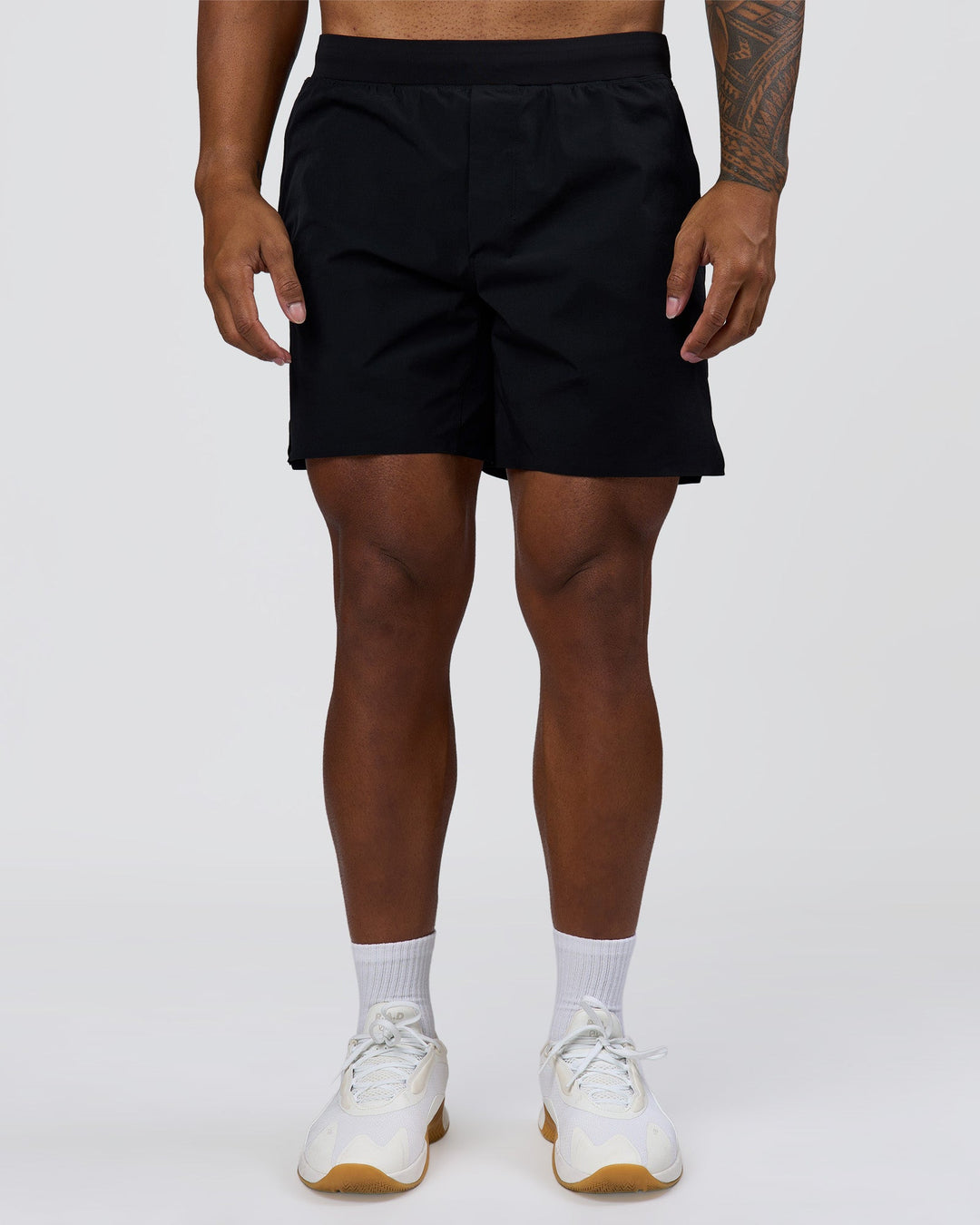 Man wearing Hybrid Lined 7" Short - Black | Model:Xav | Size:L - view 6