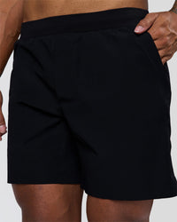 Man wearing Hybrid Lined 7" Short - Black | Model:Xav | Size:L | Thumbnail Index: 6