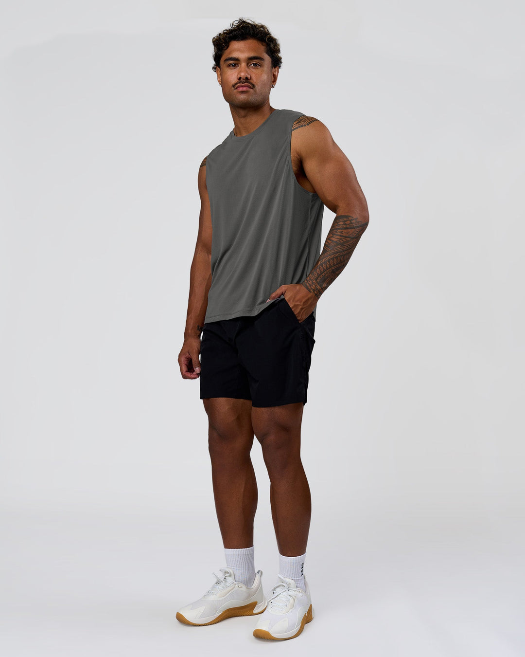 Man wearing Hybrid Lined 7" Short - Black | Model:Xav | Size:L - view 12