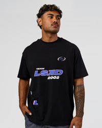 Man wearing League Heavyweight FLXCotton Oversized Tee - Black-Power Cobalt | Model:Xav | Size:L | Thumbnail Index: 1