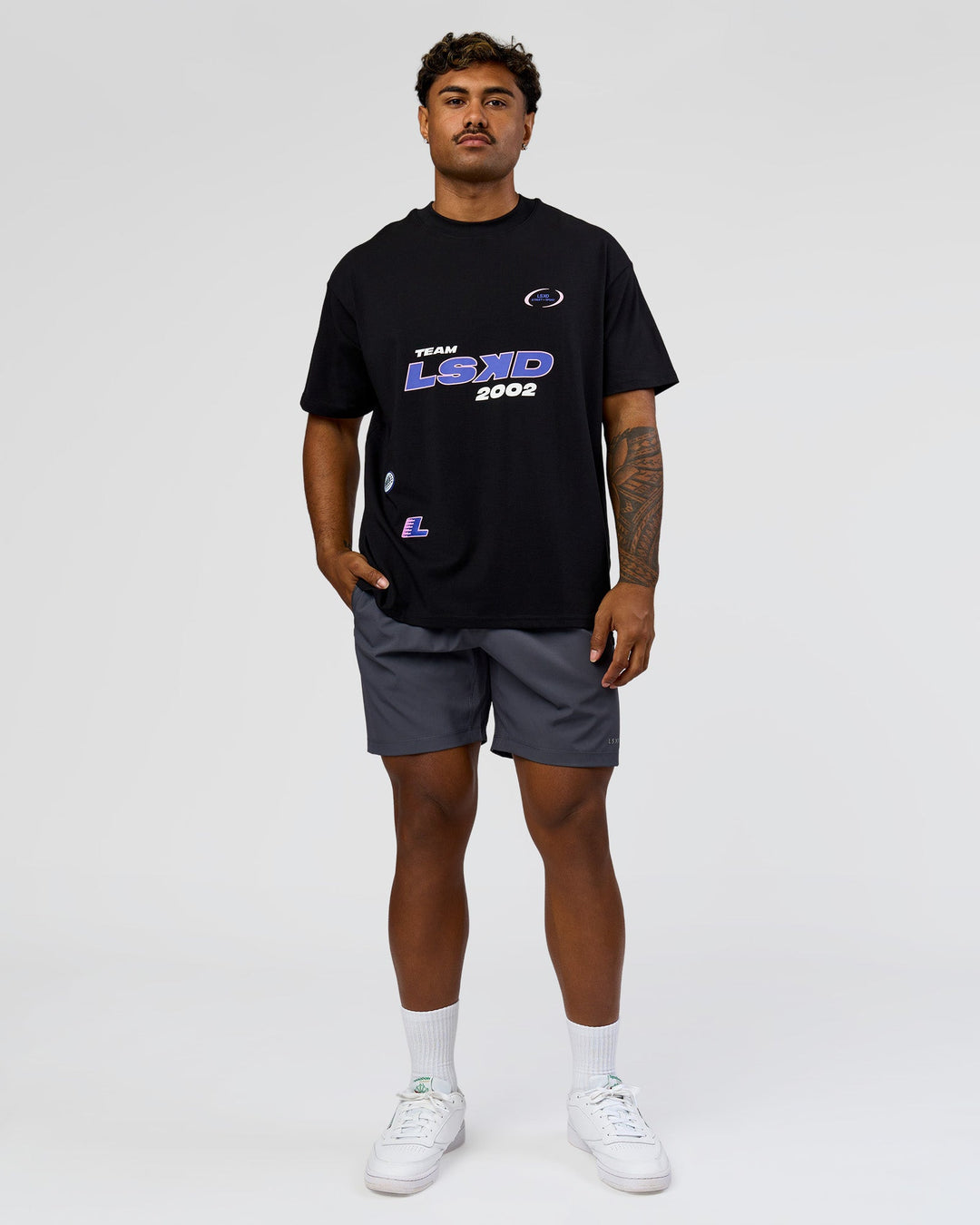 Man wearing League Heavyweight FLXCotton Oversized Tee - Black-Power Cobalt | Model:Xav | Size:L - view 8