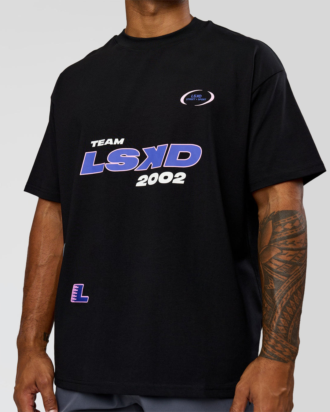 Man wearing League Heavyweight FLXCotton Oversized Tee - Black-Power Cobalt | Model:Xav | Size:L - view 14