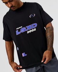 Man wearing League Heavyweight FLXCotton Oversized Tee - Black-Power Cobalt | Model:Xav | Size:L | Thumbnail Index: 6