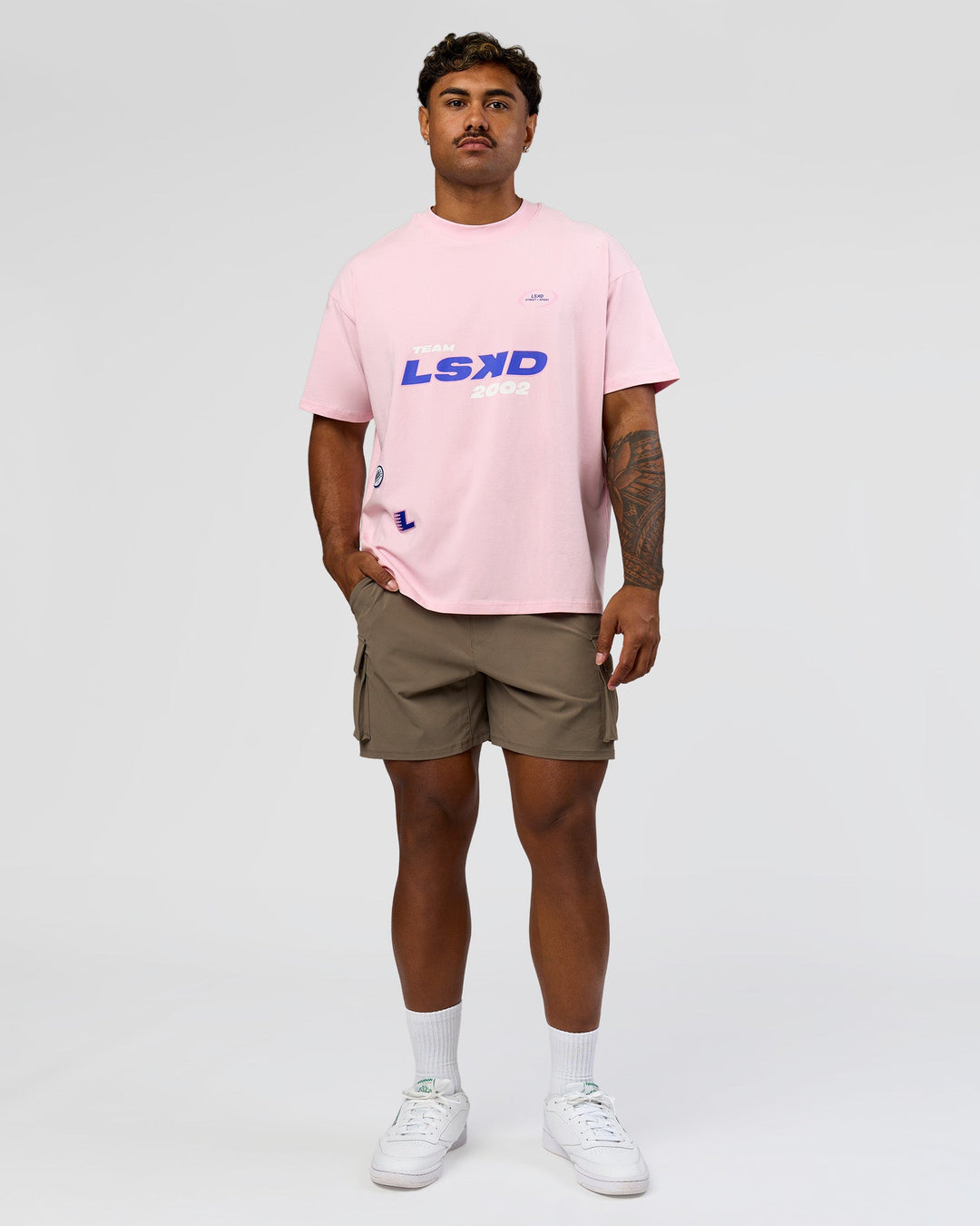 Man wearing League Heavyweight FLXCotton Oversized Tee - Marshmallow-Power Cobalt | Model:Xav | Size:L - view 4