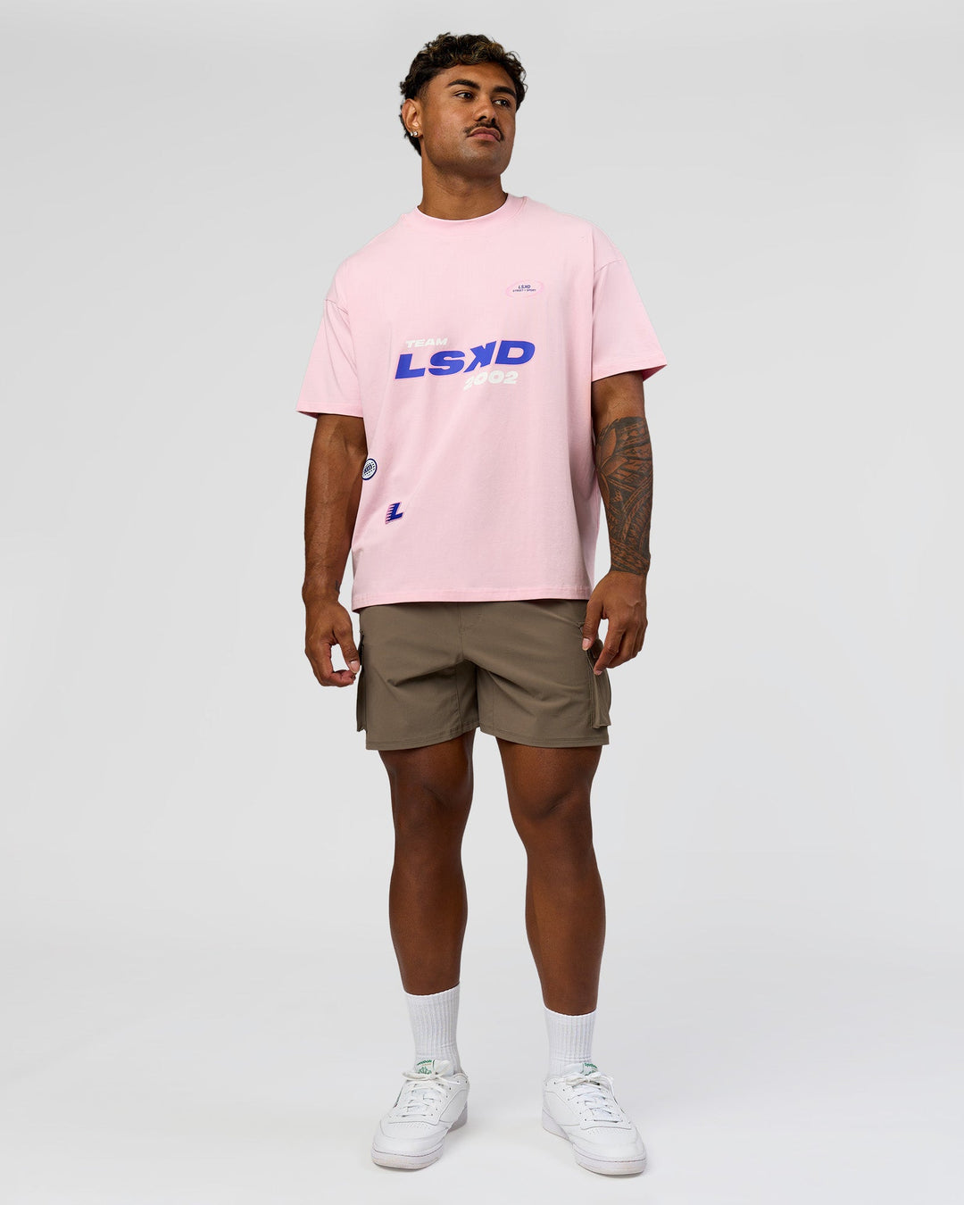 Man wearing League Heavyweight FLXCotton Oversized Tee - Marshmallow-Power Cobalt | Model:Xav | Size:L - view 8