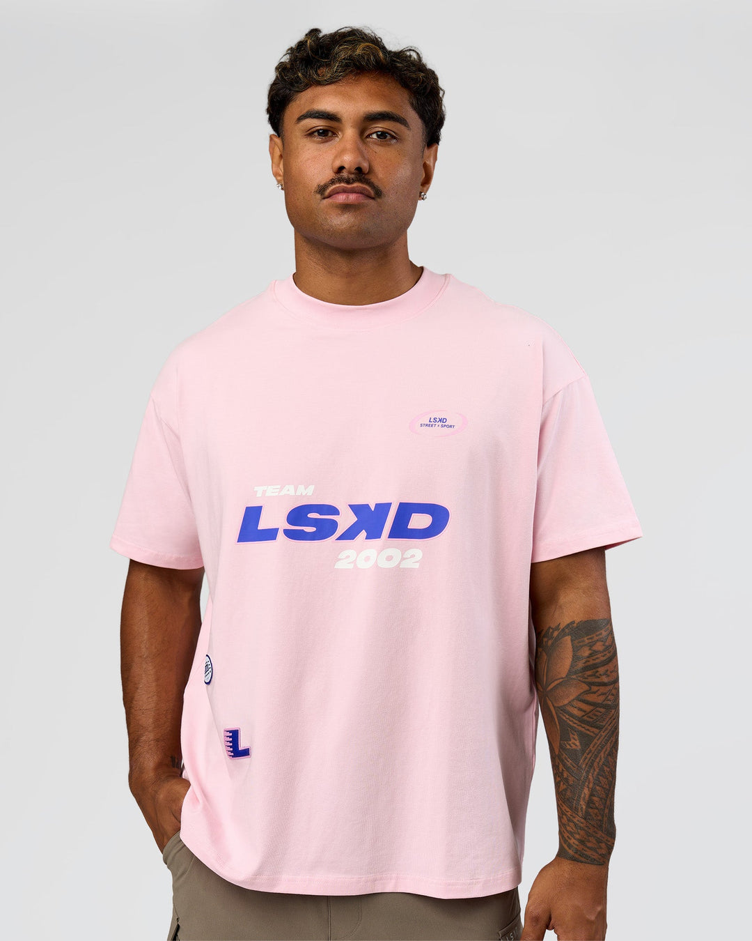 Man wearing League Heavyweight FLXCotton Oversized Tee - Marshmallow-Power Cobalt | Model:Xav | Size:L - view 13