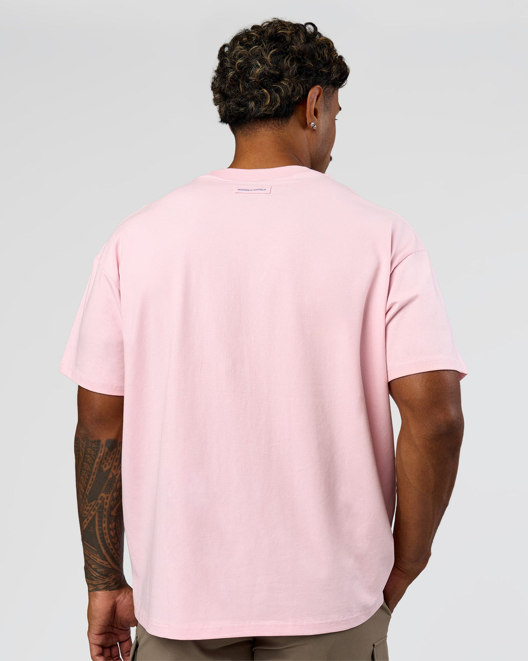 Man wearing League Heavyweight FLXCotton Oversized Tee - Marshmallow-Power Cobalt | Model:Xav | Size:L - view 3