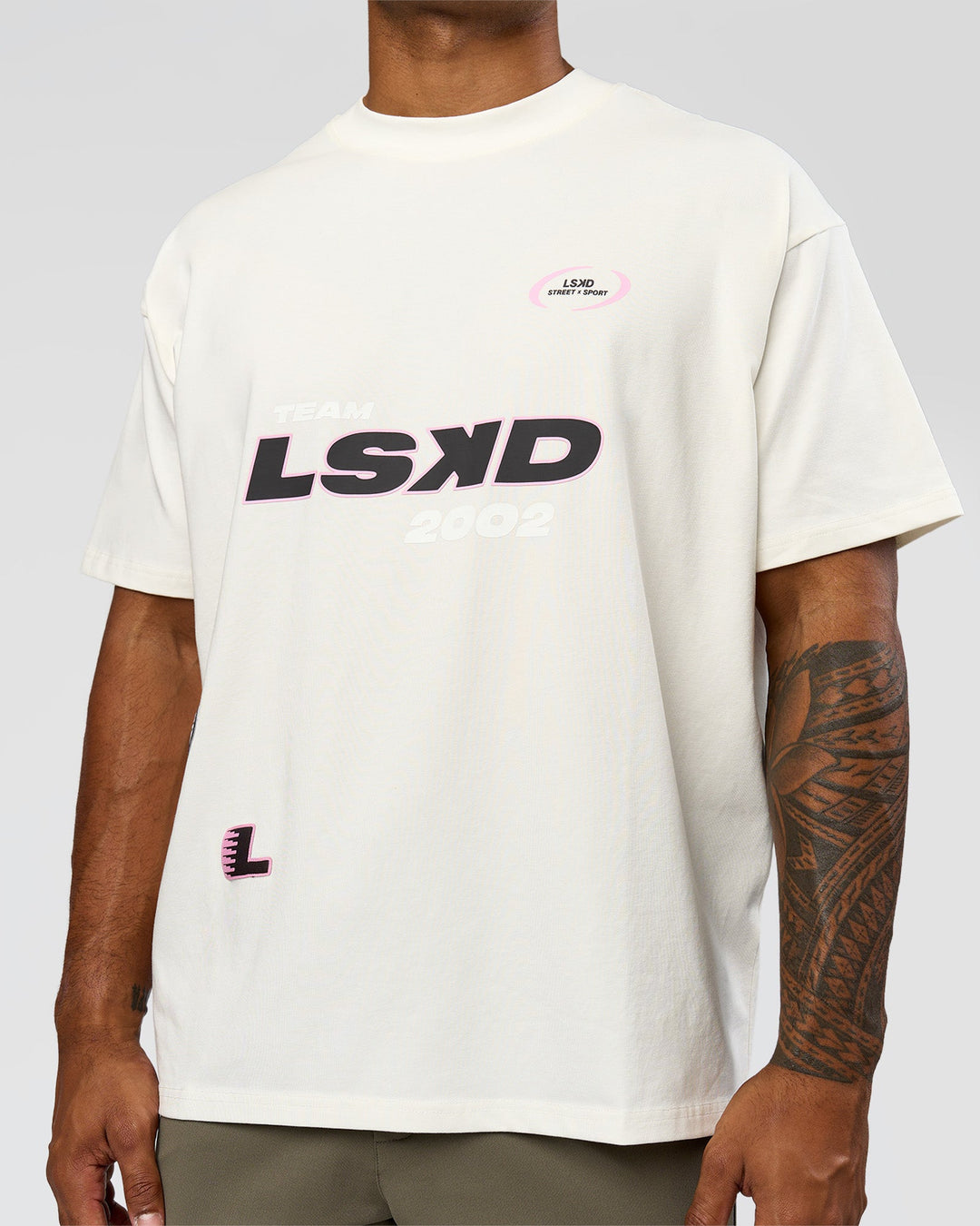 Man wearing League Heavyweight FLXCotton Oversized Tee - Off White-Ground Coffee | Model:Xav | Size:L - view 10