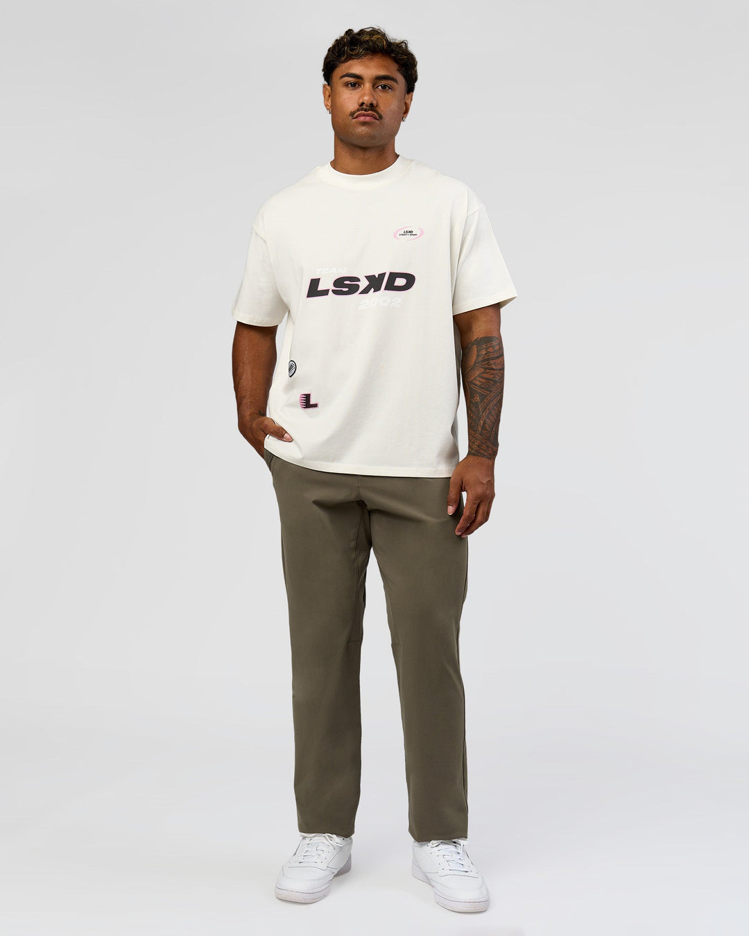 Man wearing League Heavyweight FLXCotton Oversized Tee - Off White-Ground Coffee | Model:Xav | Size:L - view 13