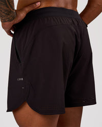 Man wearing Lift 6" Short - Black-Reflective | Model:Xav | Size:L | Thumbnail Index: 1