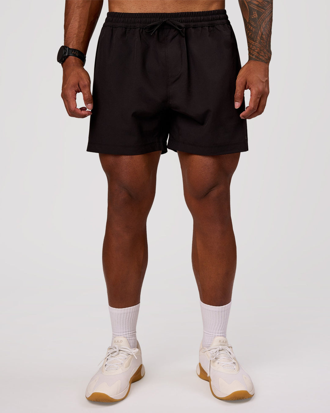 Man wearing Rep 5" Performance Short - Black | Model:Xav | Size:L - view 6