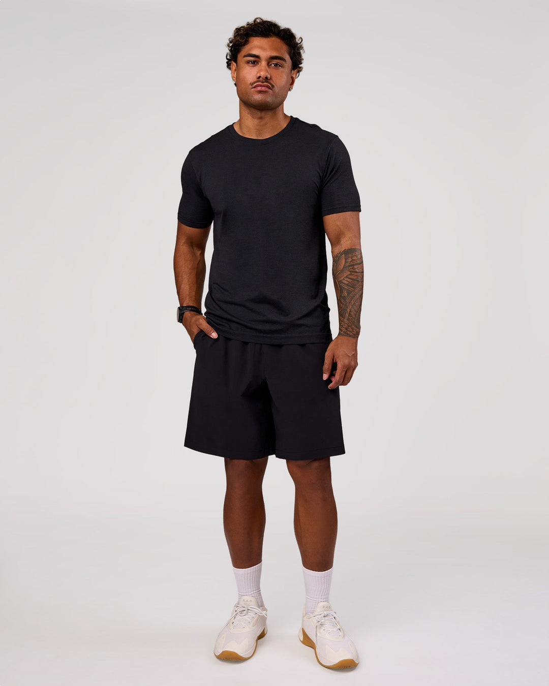 Man wearing Rep Movement 9" Training Short - Black | Model:Xav | Size:L - view 4
