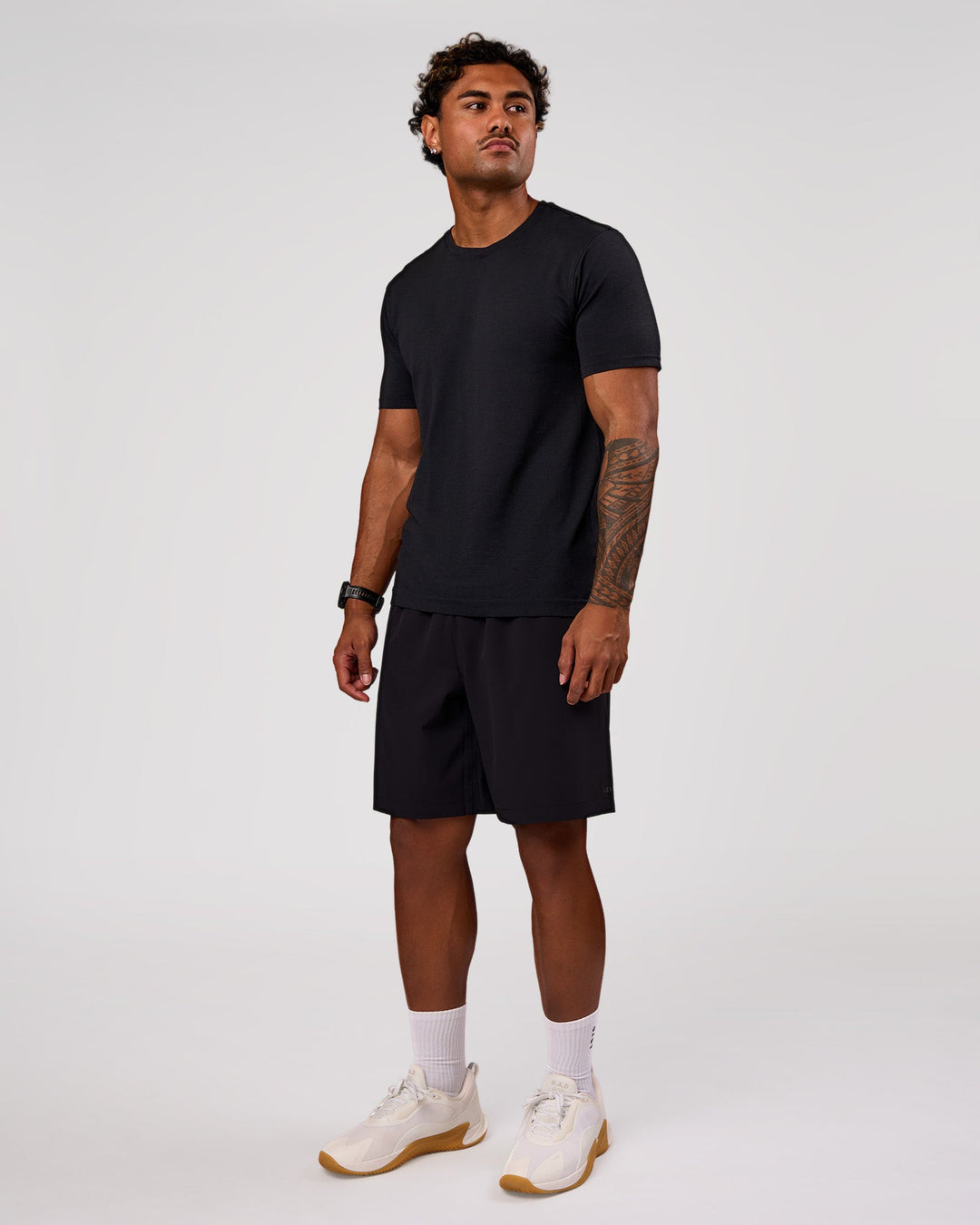 Man wearing Rep Movement 9" Training Short - Black | Model:Xav | Size:L - view 5