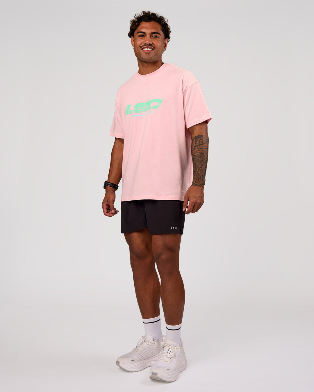 Man wearing Sideline FLXCotton Oversized Tee - Marshmallow-Jelly Mint | Model:Xav | Size:L - view 13
