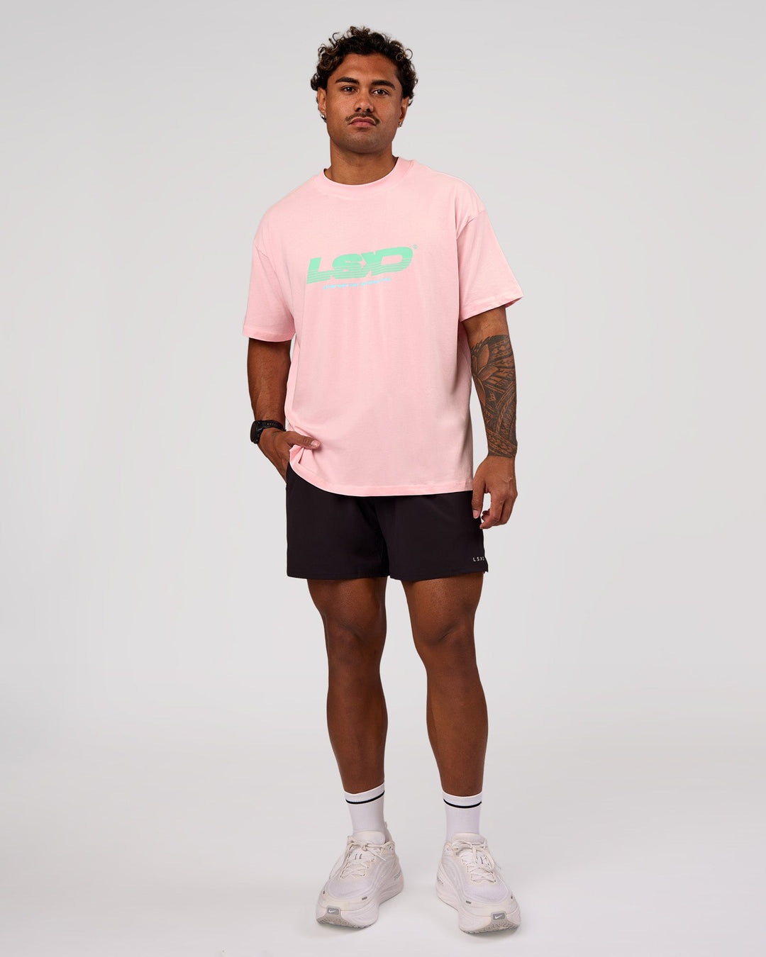 Man wearing Sideline FLXCotton Oversized Tee - Marshmallow-Jelly Mint | Model:Xav | Size:L - view 15