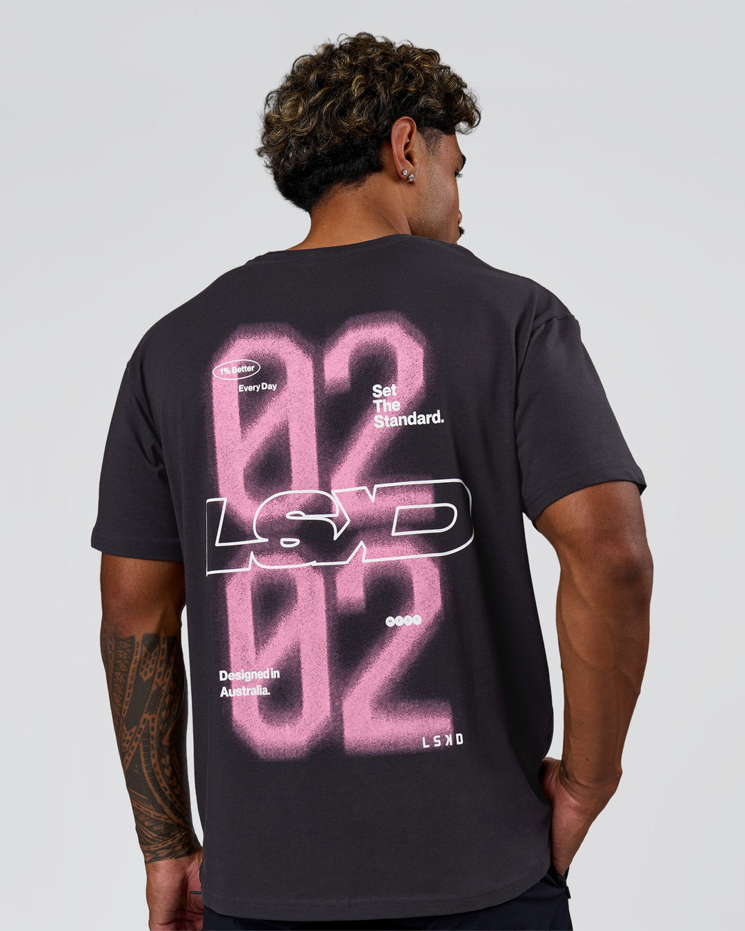 Man wearing SoCal 26 FLXCotton Oversize Tee  - Onyx-Pink Rose | Model:Xav | Size:L - view 2