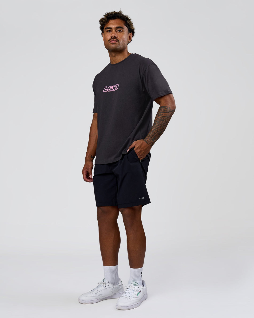 Man wearing SoCal 26 FLXCotton Oversize Tee  - Onyx-Pink Rose | Model:Xav | Size:L - view 11