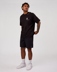 Man wearing Values Manifesto Heavyweight Oversized Tee  - Black-White | Model:Xav | Size:L | Thumbnail Index: 10