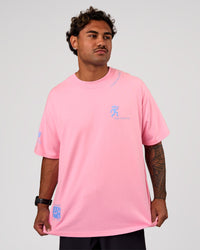 Man wearing Values Manifesto Heavyweight Oversized Tee  - Pink Rose-Open Air | Model:Xav | Size:L | Thumbnail Index: 1