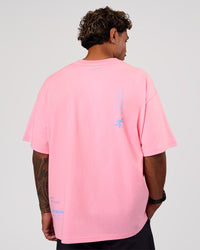 Man wearing Values Manifesto Heavyweight Oversized Tee  - Pink Rose-Open Air | Model:Xav | Size:L | Thumbnail Index: 4