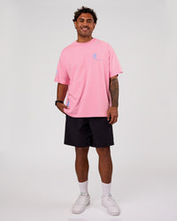 Man wearing Values Manifesto Heavyweight Oversized Tee  - Pink Rose-Open Air | Model:Xav | Size:L | Thumbnail Index: 6