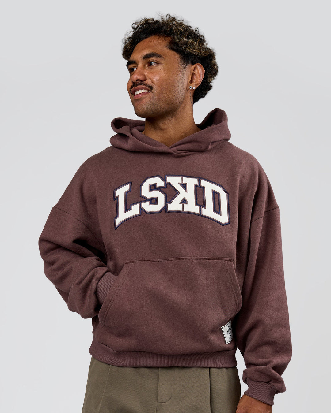 Man wearing Varsity Boxy Hoodie - Cocoa Powder-Off White | Model:Xav | Size:L - view 4