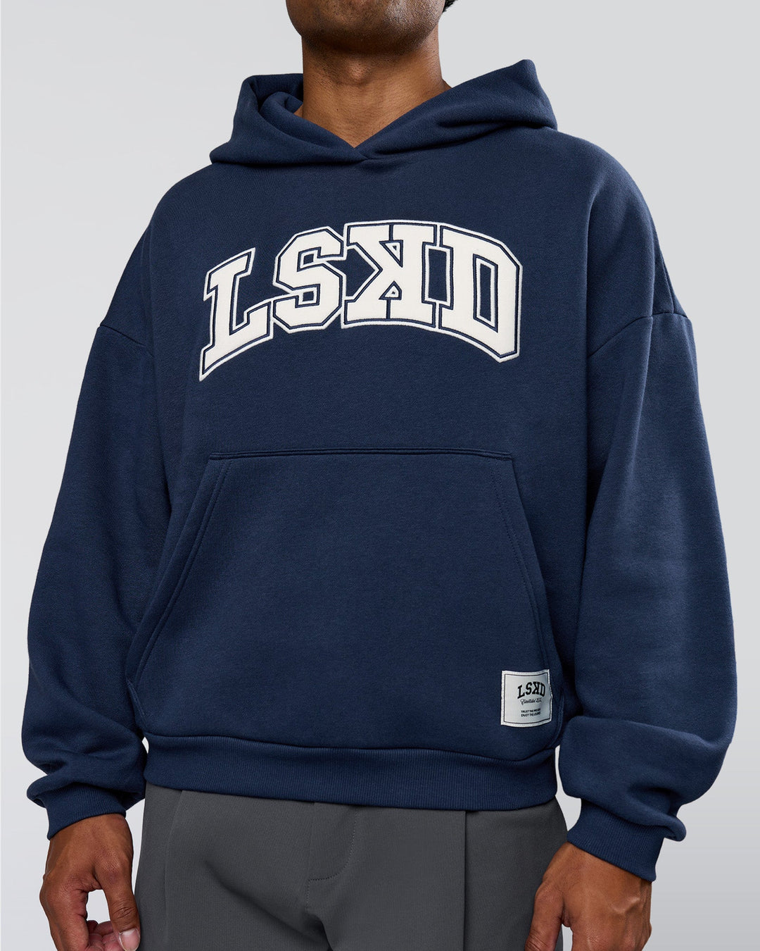 Man wearing Varsity Boxy Hoodie - Future Navy-White | Model:Xav | Size:L - view 4