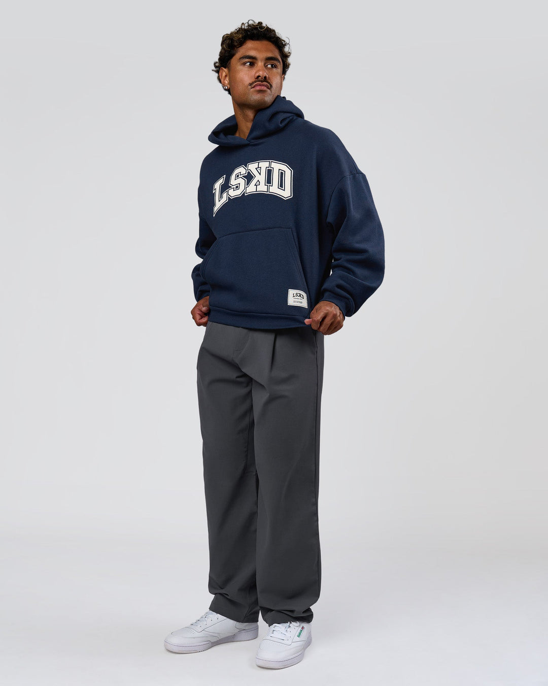 Man wearing Varsity Boxy Hoodie - Future Navy-White | Model:Xav | Size:L - view 6
