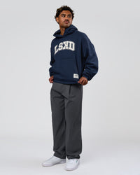 Man wearing Varsity Boxy Hoodie - Future Navy-White | Model:Xav | Size:L | Thumbnail Index: 5