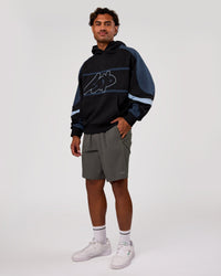 Man wearing Vibe Oversized Hoodie - Black-Future Navy | Model:Xav | Size:L | Thumbnail Index: 8