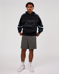 Man wearing Vibe Oversized Hoodie - Black-Future Navy | Model:Xav | Size:L | Thumbnail Index: 10