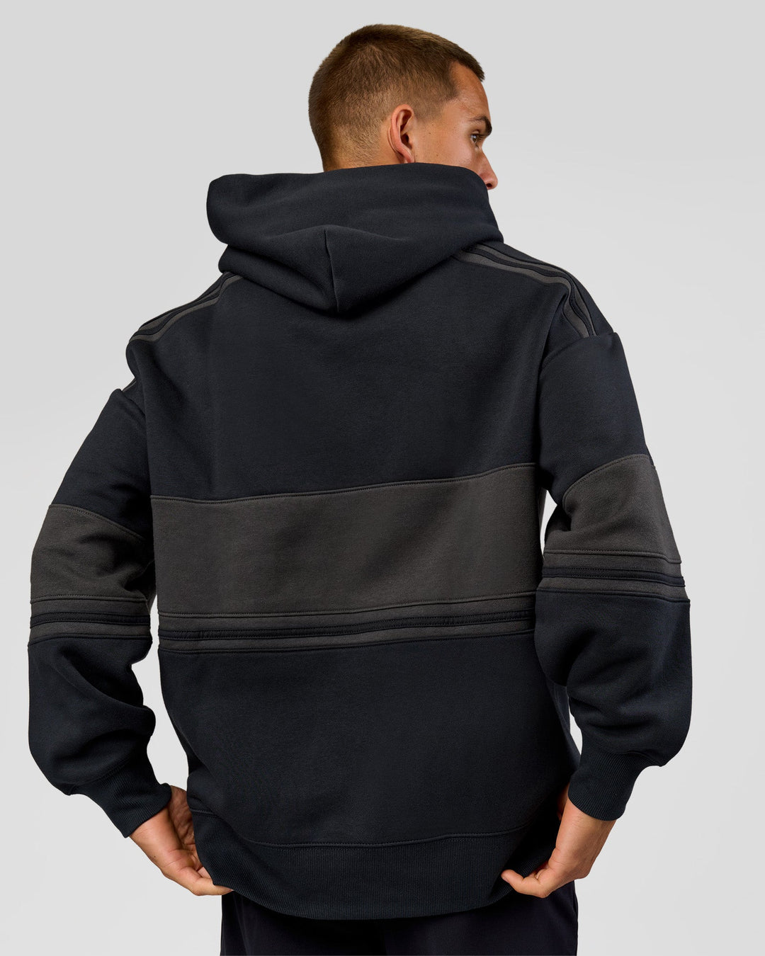 Man wearing A-Team Oversized Hoodie - Caviar-Onyx | Model:Albert | Size:M - view 5