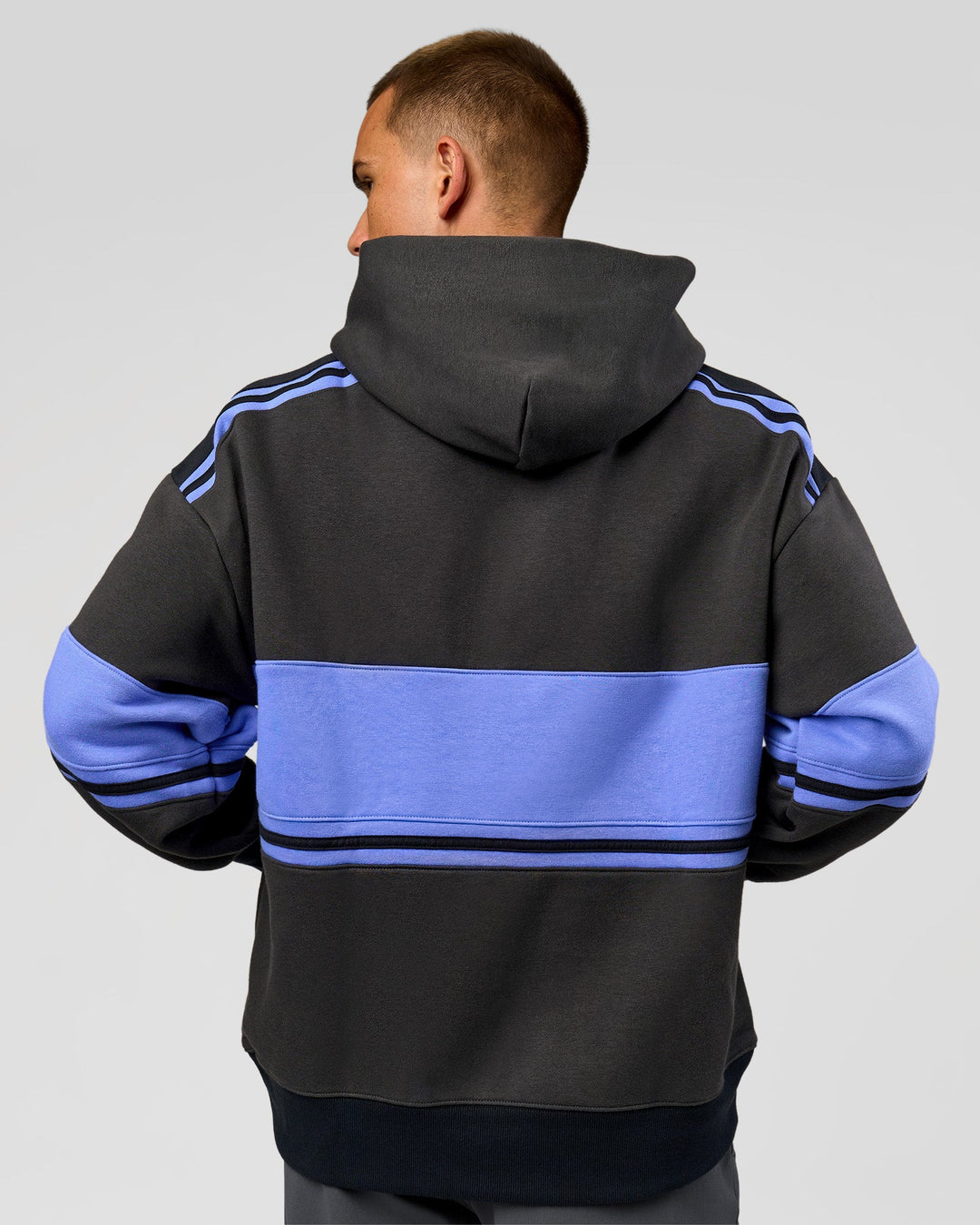 Man wearing A-Team Oversized Hoodie - Onyx-Bluebell | Model:Albert | Size:M - view 9