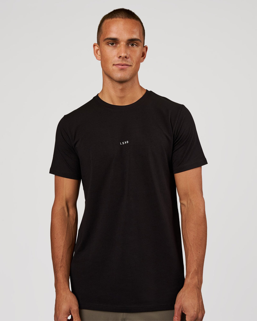 Man wearing Base FLXCotton Tee - Black | Model:Albert | Size:M - view 1