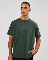 Man wearing Base FLXCotton Tee - Midnight Green Washed | Model:Albert | Size:M | Thumbnail Index: 0