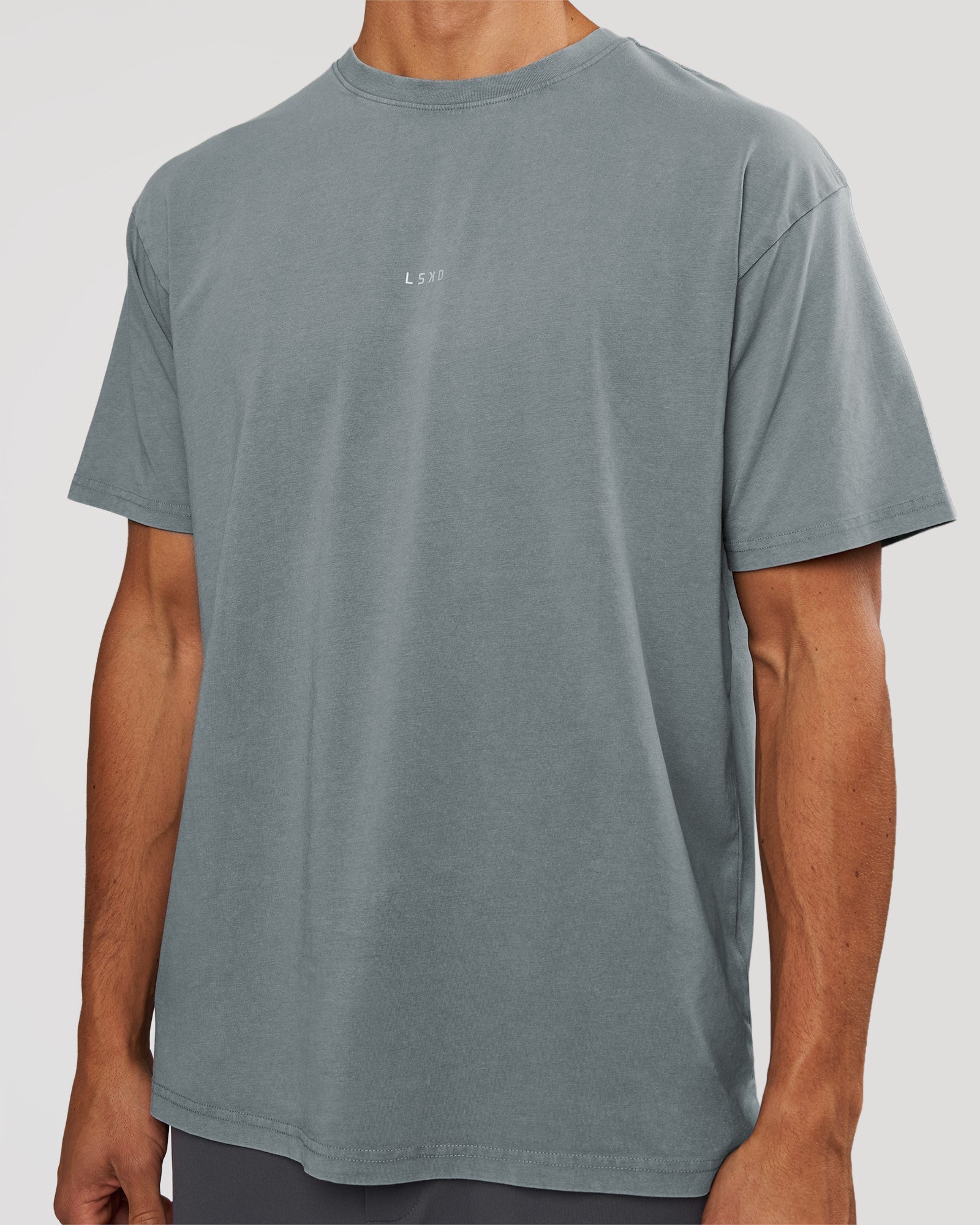 Man wearing Base FLXCotton Tee Oversized - Blue Mirage Washed | Model:Albert | Size:M