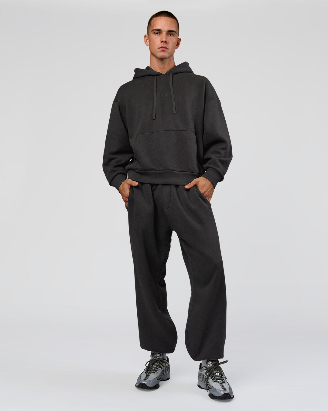 Man wearing Base Oversized DC Hoodie - Onyx | Model:Albert | Size:M - view 11