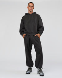 Man wearing Base Oversized DC Hoodie - Onyx | Model:Albert | Size:M | Thumbnail Index: 10
