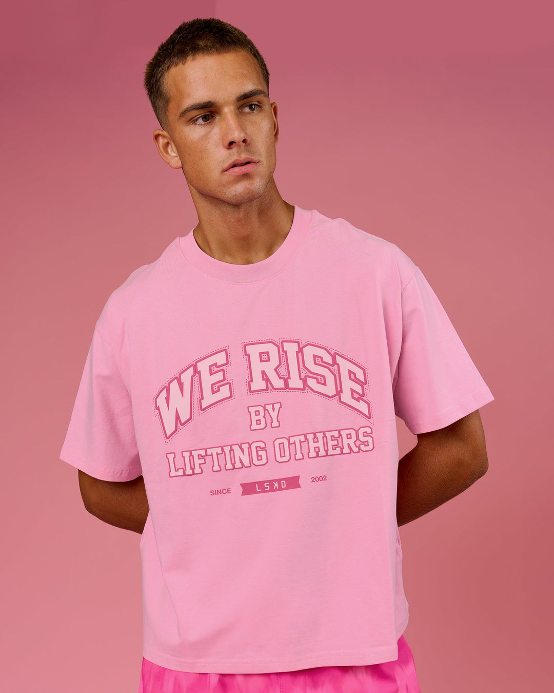 Man wearing BCAM Heavyweight FLXCotton Graphic Boxed Tee - Pink Rose | Model:Albert | Size:M - view 2