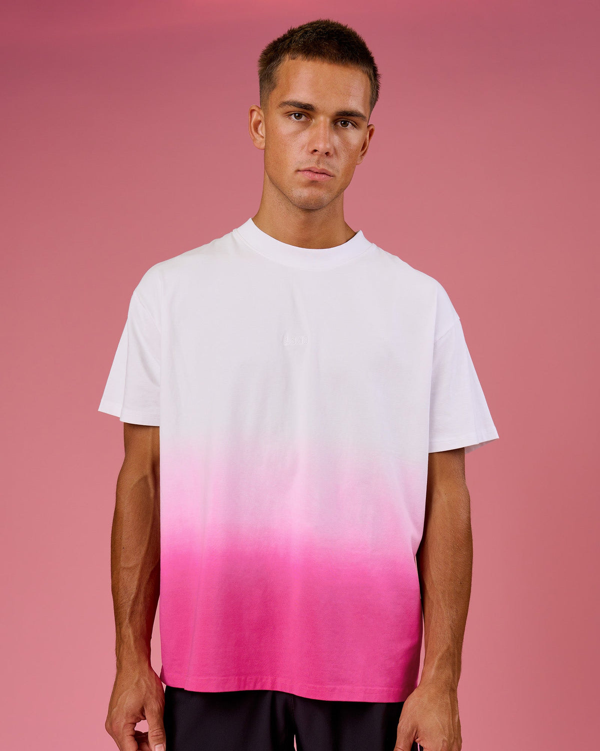 Man wearing BCAM Ombre Heavyweight FLXCotton Oversized Tee  - White-Ultra Pink | Model:Albert | Size:M