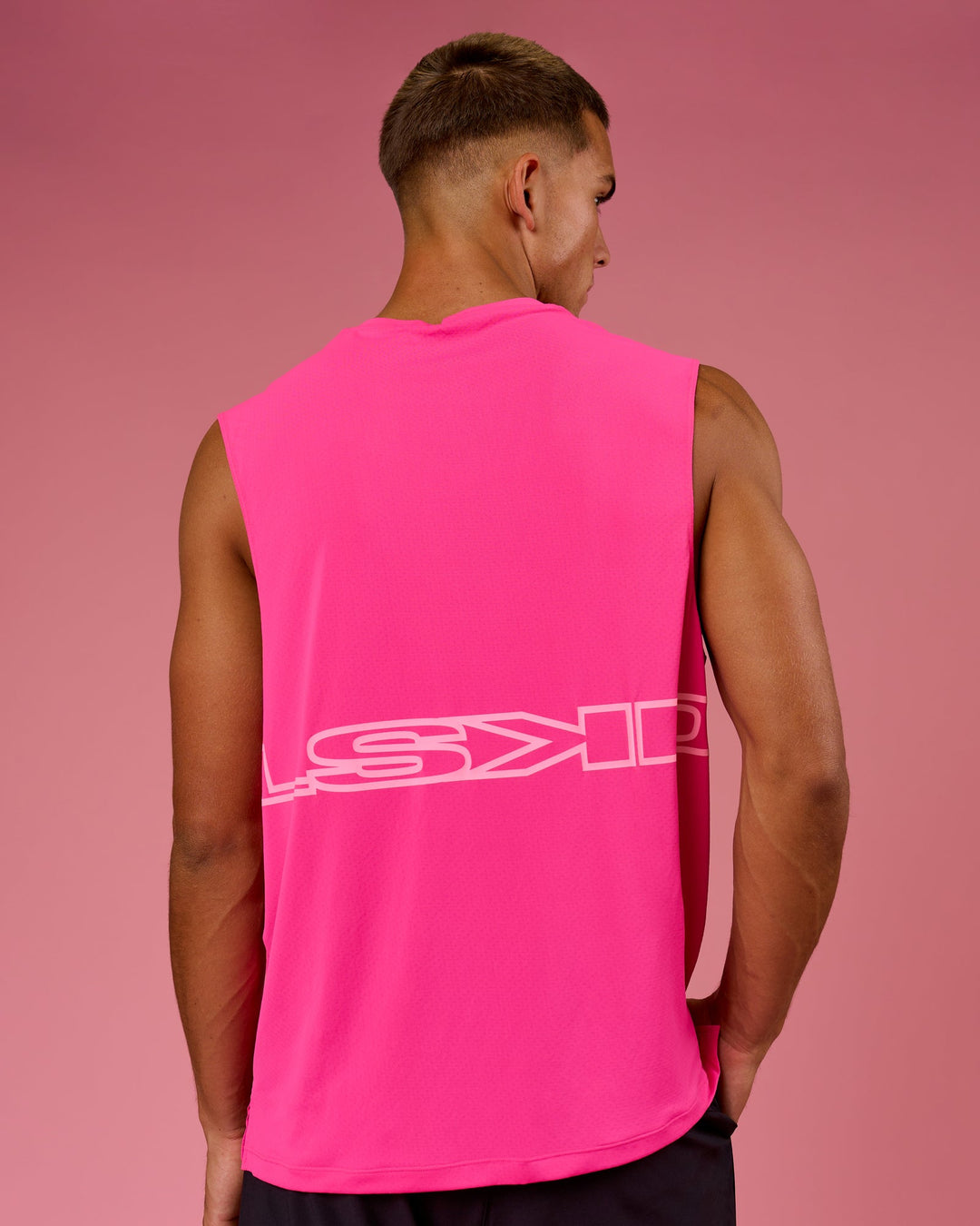 Man wearing BCAM Rep Muscle Training Tank - Ultra Pink | Model:Albert | Size:M - view 1