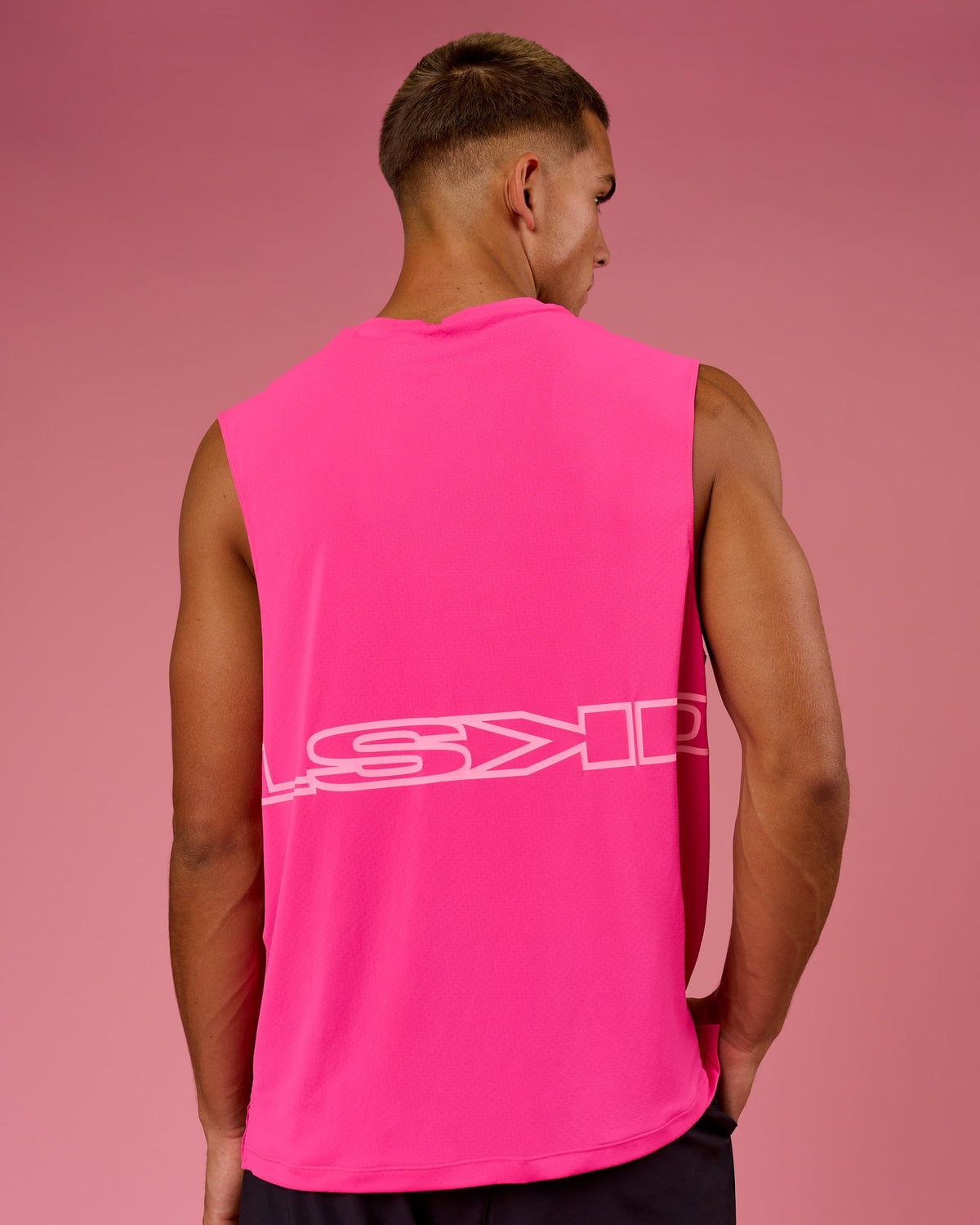Man wearing BCAM Rep Muscle Training Tank - Ultra Pink | Model:Albert | Size:M