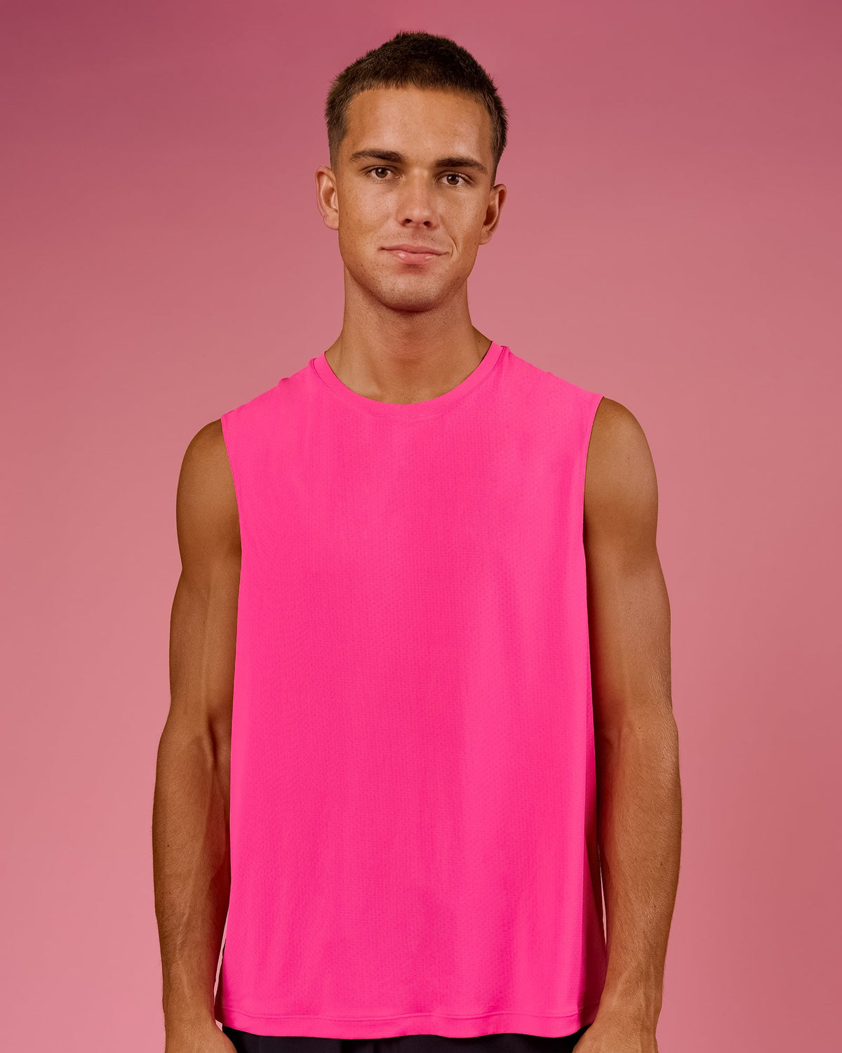 Man wearing BCAM Rep Muscle Training Tank - Ultra Pink | Model:Albert | Size:M