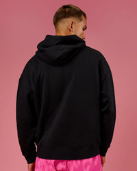 Man wearing BCAM Unisex Oversized Hoodie - Black | Model:Albert | Size:M | Thumbnail Index: 7