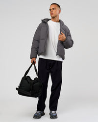 Man wearing Blackout Puffer Jacket - Dark Storm-Black | Model:Albert | Size:M | Thumbnail Index: 8