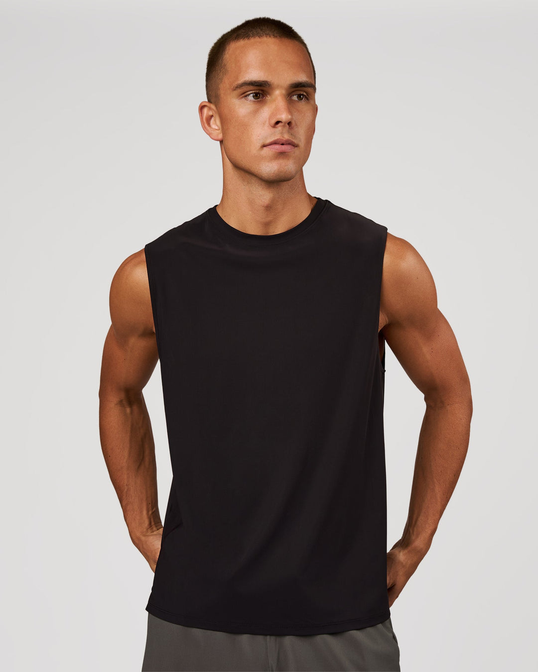 Man wearing Cadence Swift Muscle Tank - Black | Model:Albert | Size:M - view 8